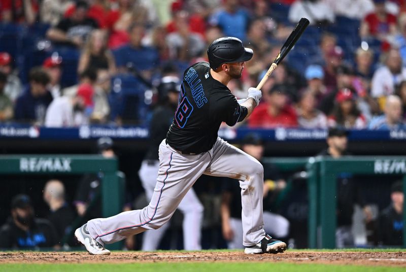 Sep 9, 2023; Philadelphia, Pennsylvania, USA; Miami Marlins catcher Jacob Stallings (58) hits an RBI double against the Philadelphia Phillies in the fifth inning at Citizens Bank Park. Mandatory Credit: Kyle Ross-USA TODAY Sports