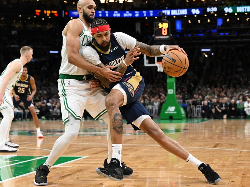 BOSTON, MASSACHUSETTS - JANUARY 29: Brandon Ingram #14 of the New Orleans Pelicans drives to the basket against Derrick White #9 of the Boston Celtics during the fourth quarter at the TD Garden on January 29, 2024 in Boston, Massachusetts. NOTE TO USER: User expressly acknowledges and agrees that, by downloading and or using this photograph, User is consenting to the terms and conditions of the Getty Images License Agreement. (Photo by Brian Fluharty/Getty Images)