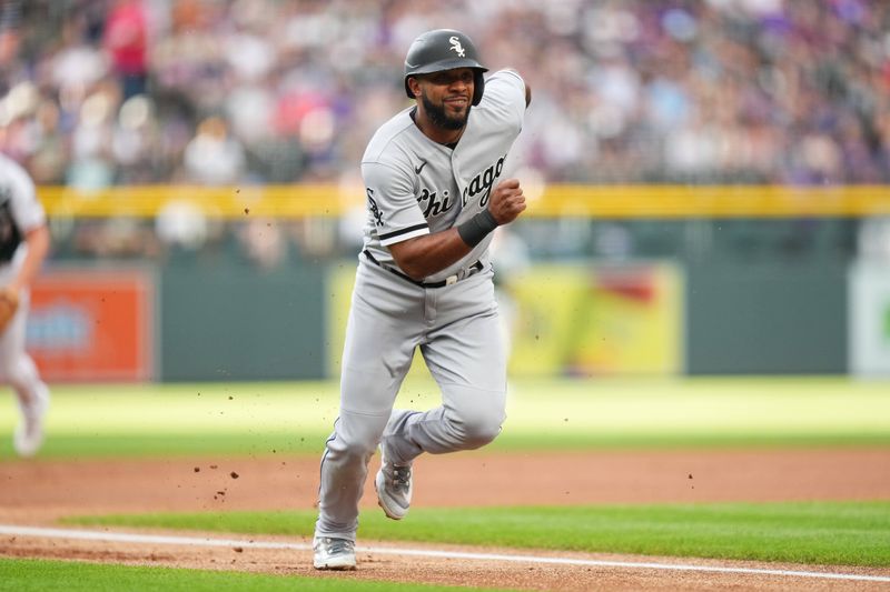 Aug 19, 2023; Denver, Colorado, USA; Chicago White Sox shortstop Elvis Andrus (1) heads home to score a run in the first inning against the Colorado Rockies at Coors Field. Mandatory Credit: Ron Chenoy-USA TODAY Sports