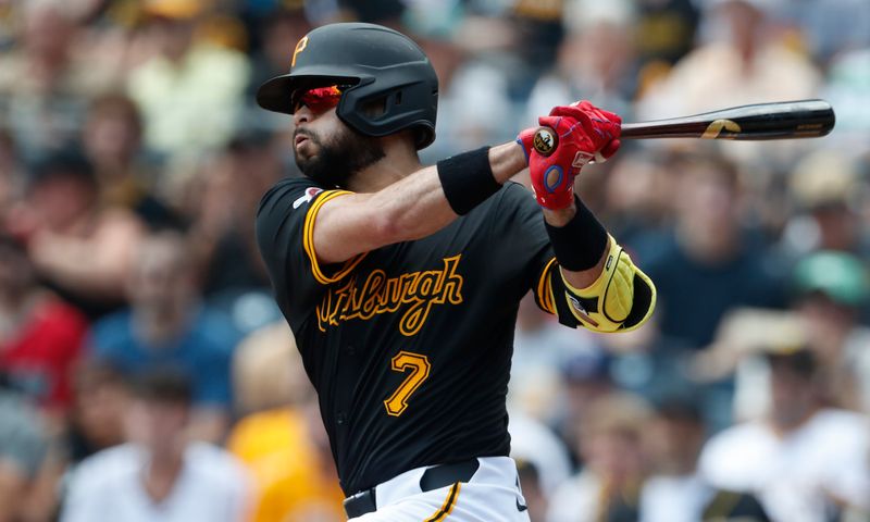 Aug 4, 2024; Pittsburgh, Pennsylvania, USA;  Pittsburgh Pirates second baseman Isiah Kiner-Falefa (7) hits  a double against the Arizona Diamondbacks during the first inning at PNC Park. Mandatory Credit: Charles LeClaire-USA TODAY Sports