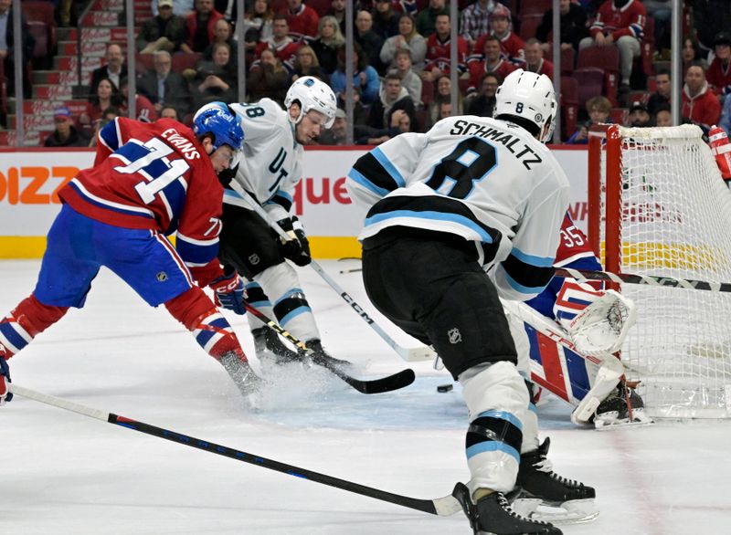 Nov 26, 2024; Montreal, Quebec, CAN; Utah Hockey Club defenseman Mikhail Sergachev (98) scores the winning goalduring the overtime period against the Montreal Canadiens at the Bell Centre. Mandatory Credit: Eric Bolte-Imagn Images