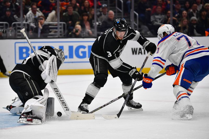 Dec 30, 2023; Los Angeles, California, USA; Los Angeles Kings defenseman Matt Roy (3) helps goaltender Cam Talbot (39) defend the goal against Edmonton Oilers center Ryan McLeod (71) during the third period at Crypto.com Arena. Mandatory Credit: Gary A. Vasquez-USA TODAY Sports