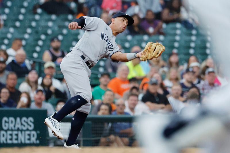 Aug 29, 2023; Detroit, Michigan, USA; New York Yankees third baseman Oswald Peraza (91) makes a catch in the third inning against the Detroit Tigers at Comerica Park. Mandatory Credit: Rick Osentoski-USA TODAY Sports