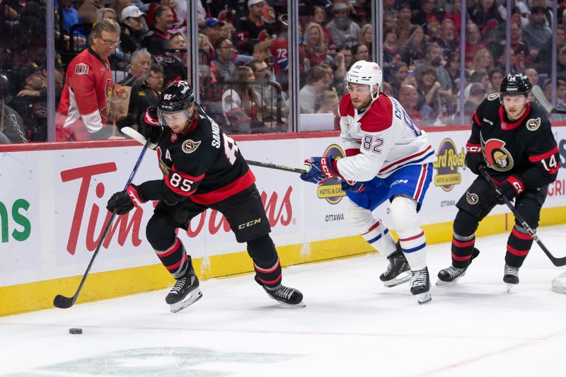 Oct 5, 2024; Ottawa, Ontario, CAN; Ottawa Senators defenseman Jake Sanderson (85) skates with the puck with Montreal Canadiens left wing Lucas Condotta (82) in pursuit during the second period at the Canadian Tire Centre. Mandatory Credit: Marc DesRosiers-Imagn Images