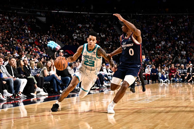 PHILADELPHIA, PA - MARCH 16: Tre Mann #23 of the Charlotte Hornets handles the ball during the game against the Philadelphia 76ers on March 16, 2024 at the Wells Fargo Center in Philadelphia, Pennsylvania NOTE TO USER: User expressly acknowledges and agrees that, by downloading and/or using this Photograph, user is consenting to the terms and conditions of the Getty Images License Agreement. Mandatory Copyright Notice: Copyright 2024 NBAE (Photo by David Dow/NBAE via Getty Images)