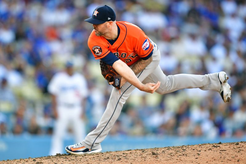 Jun 25, 2023; Los Angeles, California, USA; Houston Astros relief pitcher Ryan Pressly (55) throws against the Los Angeles Dodgers during the ninth inning at Dodger Stadium. Mandatory Credit: Gary A. Vasquez-USA TODAY Sports