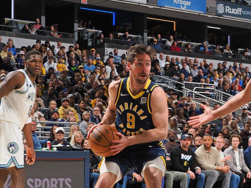 INDIANAPOLIS, IN - MARCH 7: T.J. McConnell #9 of the Indiana Pacers handles the ball during the game against the Minnesota Timberwolves on March 7, 2024 at Gainbridge Fieldhouse in Indianapolis, Indiana. NOTE TO USER: User expressly acknowledges and agrees that, by downloading and or using this Photograph, user is consenting to the terms and conditions of the Getty Images License Agreement. Mandatory Copyright Notice: Copyright 2024 NBAE (Photo by Ron Hoskins/NBAE via Getty Images)