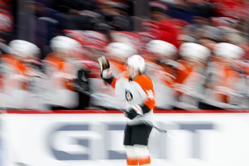 Mar 1, 2024; Washington, District of Columbia, USA; Philadelphia Flyers right wing Bobby Brink (10) celebrates with teammates after scoring a goal against the Washington Capitals in the first period at Capital One Arena. Mandatory Credit: Geoff Burke-USA TODAY Sports