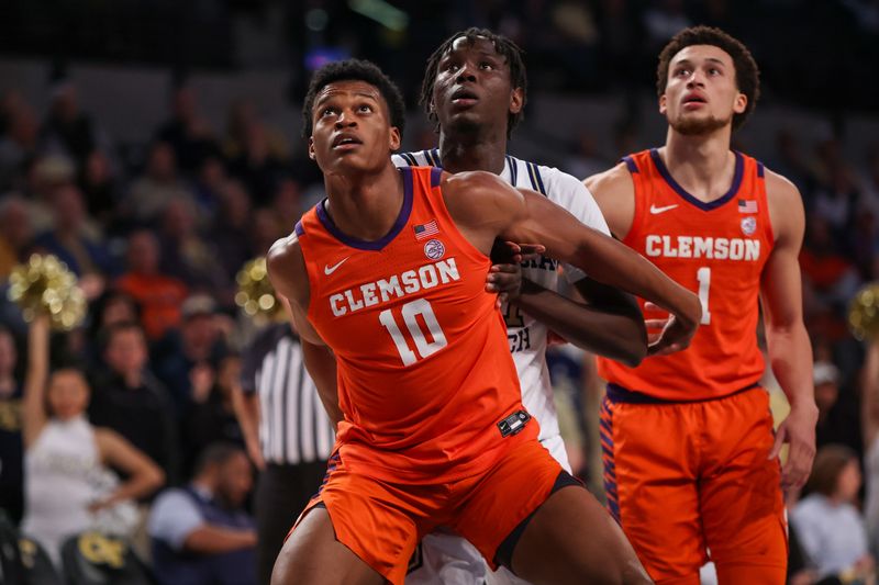 Feb 21, 2024; Atlanta, Georgia, USA; Clemson Tigers forward RJ Godfrey (10) boxes out Georgia Tech Yellow Jackets forward Baye Ndongo (11) in the second half at McCamish Pavilion. Mandatory Credit: Brett Davis-USA TODAY Sports
