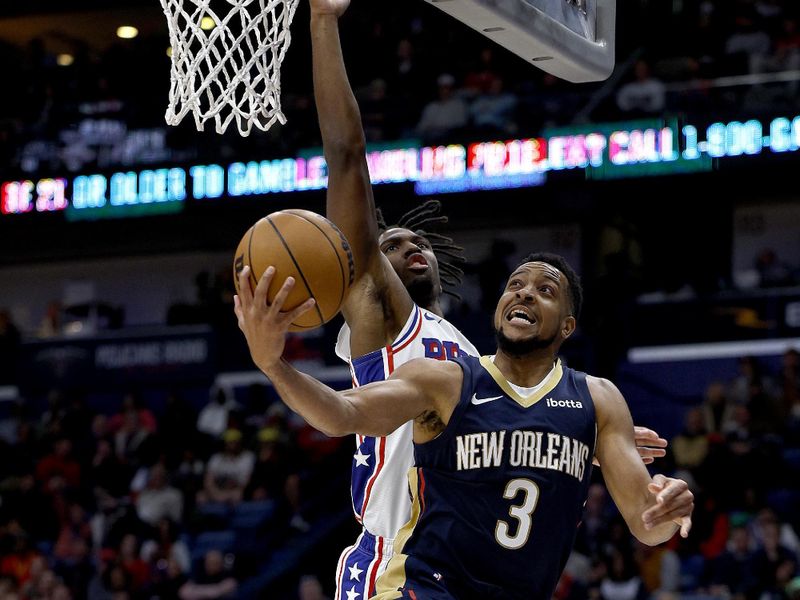 NEW ORLEANS, LOUISIANA - NOVEMBER 29: CJ McCollum #3 of the New Orleans Pelicans shoots over Tyrese Maxey #0 of the Philadelphia 76ers of the Philadelphia 76ers during the third quarter of an NBA game at Smoothie King Center on November 29, 2023 in New Orleans, Louisiana. NOTE TO USER: User expressly acknowledges and agrees that, by downloading and or using this photograph, User is consenting to the terms and conditions of the Getty Images License Agreement. (Photo by Sean Gardner/Getty Images)