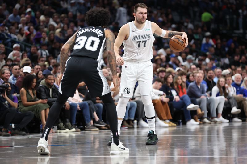 DALLAS, TX - NOVEMBER 16: Luka Doncic #77 of the Dallas Mavericks dribbles the ball during the game against the San Antonio Spurs on November 16, 2024 at American Airlines Center in Dallas, Texas. NOTE TO USER: User expressly acknowledges and agrees that, by downloading and or using this photograph, User is consenting to the terms and conditions of the Getty Images License Agreement. Mandatory Copyright Notice: Copyright 2024 NBAE (Photo by Tim Heitman/NBAE via Getty Images)