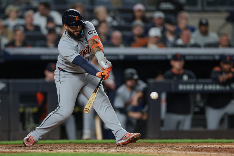 Sep 10, 2025; Bronx, New York, USA; Detroit Tigers second baseman Gleyber Torres (25) hits an RBI ground out during the seventh inning against the New York Yankees at Yankee Stadium. Mandatory Credit: Vincent Carchietta-Imagn Images