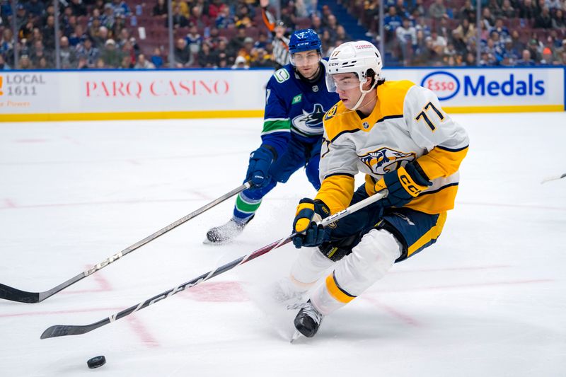 Jan 3, 2025; Vancouver, British Columbia, CAN; Vancouver Canucks defenseman Carson Soucy (7) defends against Nashville Predators forward Luke Evangelista (77) in the third period at Rogers Arena. Mandatory Credit: Bob Frid-Imagn Images