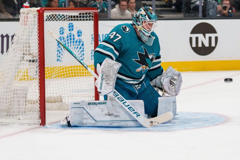 Jan 18, 2023; San Jose, California, USA; San Jose Sharks goaltender James Reimer (47) makes a save during the first period against the Dallas Stars at SAP Center at San Jose. Mandatory Credit: Neville E. Guard-USA TODAY Sports