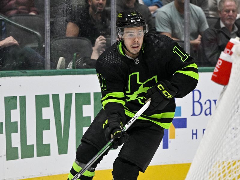 Mar 14, 2024; Dallas, Texas, USA; Dallas Stars center Logan Stankoven (11) skates against the New Jersey Devils during the second period at the American Airlines Center. Mandatory Credit: Jerome Miron-USA TODAY Sports