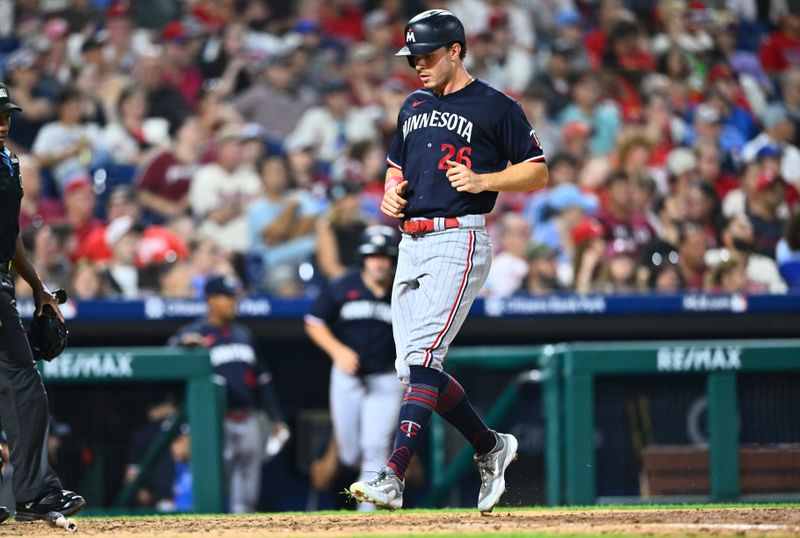 Aug 12, 2023; Philadelphia, Pennsylvania, USA; Minnesota Twins outfielder Max Kepler (26) crosses the plate to score against the Philadelphia Phillies in the seventh inning at Citizens Bank Park. Mandatory Credit: Kyle Ross-USA TODAY Sports