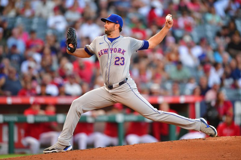 August 3, 2024; Anaheim, California, USA; New York Mets pitcher David Peterson (23) throws against the Los Angeles Angels during the first inning at Angel Stadium. Mandatory Credit: Gary A. Vasquez-USA TODAY Sports