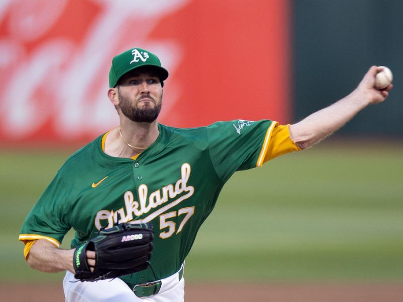 Apr 2, 2024; Oakland, California, USA; Oakland Athletics pitcher Alex Wood (57) delivers a pitch against the Boston Red Sox during the first inning at Oakland-Alameda County Coliseum. Mandatory Credit: D. Ross Cameron-USA TODAY Sports