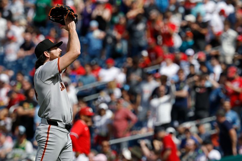 May 25, 2025; Washington, District of Columbia, USA; San Francisco Giants pitcher Ryan Walker (74) celebrates after the final out against the Washington Nationals at Nationals Park. Mandatory Credit: Geoff Burke-Imagn Images
