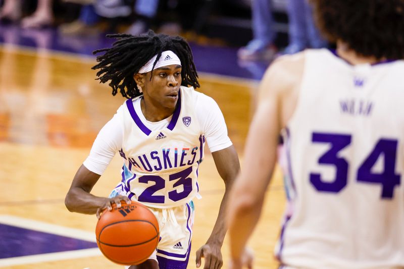 Feb 18, 2023; Seattle, Washington, USA; Washington Huskies guard Keyon Menifield (23) dribbles against the Oregon State Beavers during the second half at Alaska Airlines Arena at Hec Edmundson Pavilion. Mandatory Credit: Joe Nicholson-USA TODAY Sports