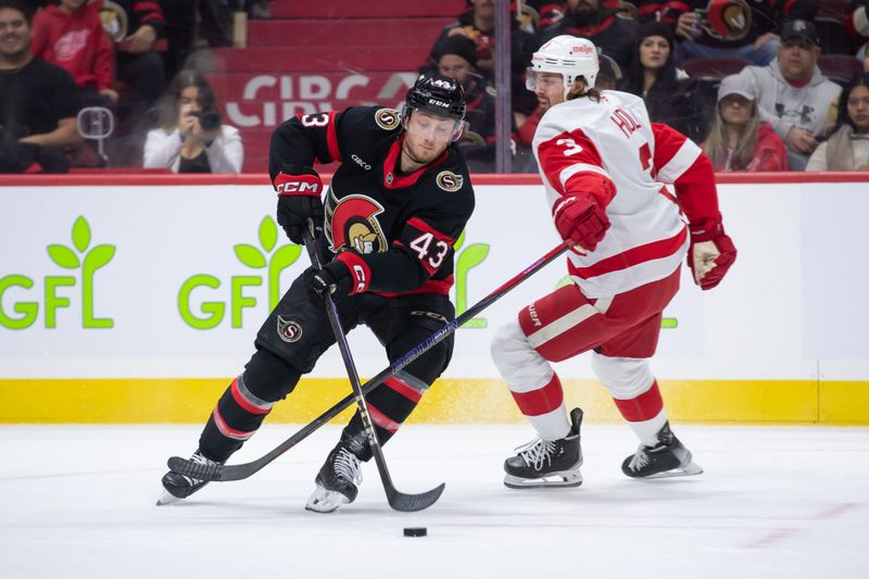 Dec 5, 2024; Ottawa, Ontario, CAN; Ottawa Senators defenseman Tyler Kleven (43) moves the puck past Detroit Red Wings defenseman Justin Holl (3) in the first period at the Canadian Tire Centre. Mandatory Credit: Marc DesRosiers-Imagn Images