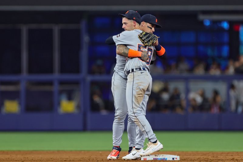 Jul 29, 2023; Miami, Florida, USA; Detroit Tigers shortstop Javier Baez (28) and second baseman Zack Short (59) celebrate after winning the game against the Miami Marlins at loanDepot Park. Mandatory Credit: Sam Navarro-USA TODAY Sports