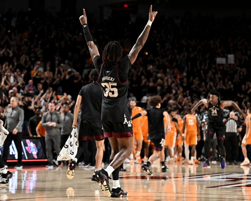 Feb 21, 2023; College Station, Texas, USA; Texas A&M Aggies guard Manny Obaseki (35) celebrates the win over Tennessee Volunteers at Reed Arena. Mandatory Credit: Maria Lysaker-USA TODAY Sports