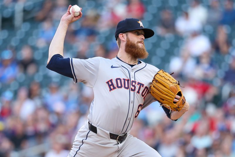 Jul 5, 2024; Minneapolis, Minnesota, USA; Houston Astros starting pitcher Shawn Dubin (66) pitches against the Minnesota Twins during the first inning at Target Field. Mandatory Credit: Matt Krohn-USA TODAY Sports