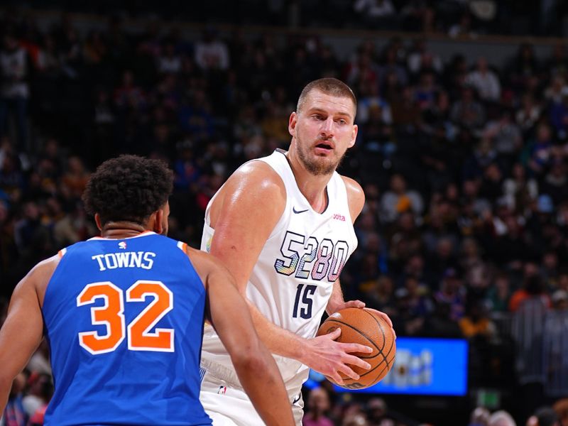 DENVER, CO - NOVEMBER 25: Nikola Jokic #15 of the Denver Nuggets looks to pass the ball during the game against the New York Knicks on November 25, 2024 at Ball Arena in Denver, Colorado. NOTE TO USER: User expressly acknowledges and agrees that, by downloading and/or using this Photograph, user is consenting to the terms and conditions of the Getty Images License Agreement. Mandatory Copyright Notice: Copyright 2024 NBAE (Photo by Garrett Ellwood/NBAE via Getty Images)