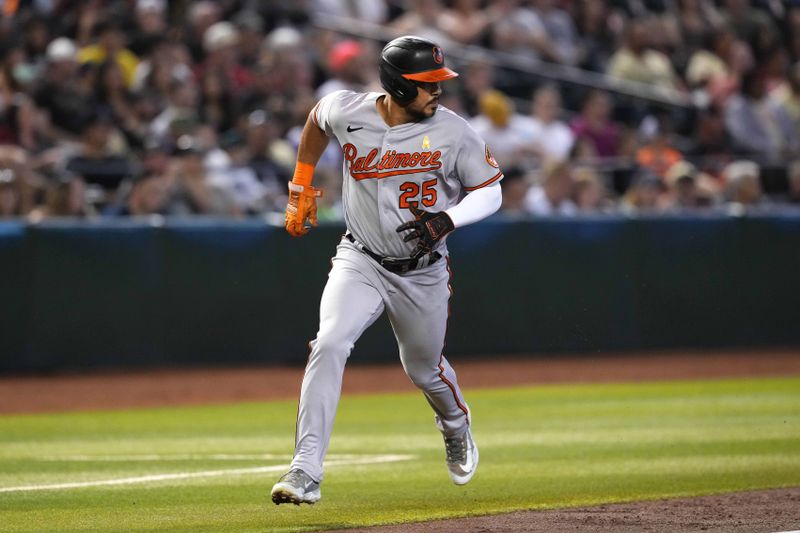 Sep 3, 2023; Phoenix, Arizona, USA; Baltimore Orioles right fielder Anthony Santander (25) scores a run against the Arizona Diamondbacks during the first inning at Chase Field. Mandatory Credit: Joe Camporeale-USA TODAY Sports