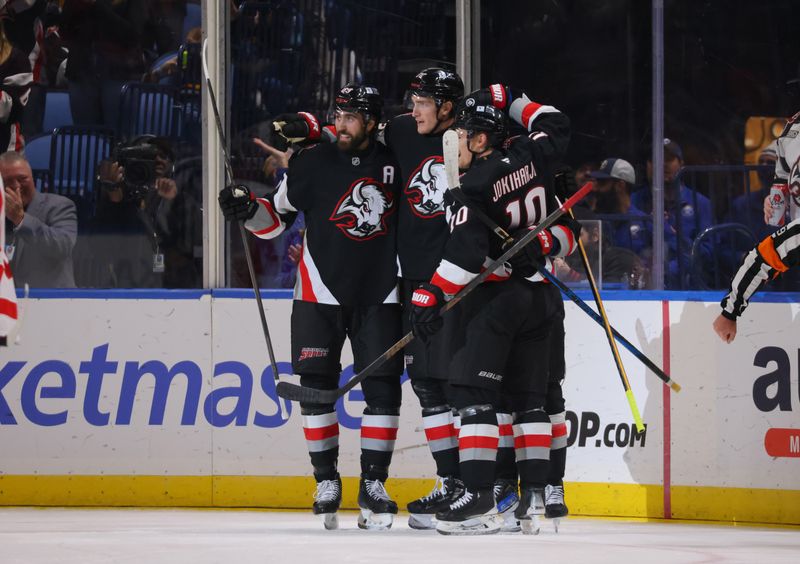 Oct 26, 2024; Buffalo, New York, USA;  Buffalo Sabres center Tage Thompson (72) celebrates his goal with teammates during the first period against the Detroit Red Wings at KeyBank Center. Mandatory Credit: Timothy T. Ludwig-Imagn Images