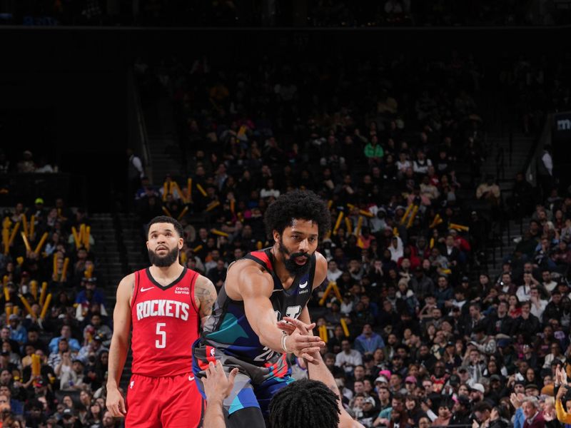 BROOKLYN, NY - JANUARY 27: Spencer Dinwiddie #26  helps up Cam Thomas #24 of the Brooklyn Nets during the game against the Houston Rockets on January 27, 2024 at Barclays Center in Brooklyn, New York. NOTE TO USER: User expressly acknowledges and agrees that, by downloading and or using this Photograph, user is consenting to the terms and conditions of the Getty Images License Agreement. Mandatory Copyright Notice: Copyright 2024 NBAE (Photo by Jesse D. Garrabrant/NBAE via Getty Images)