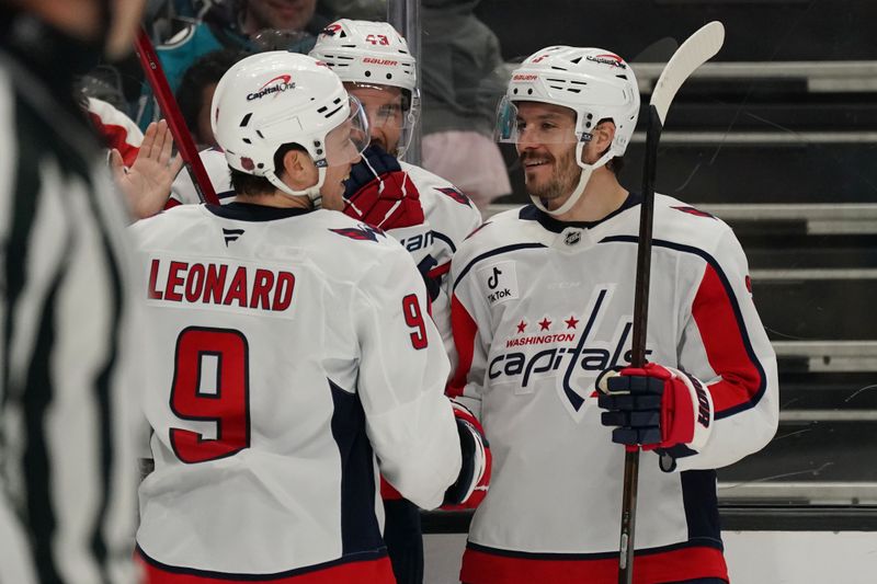 Dec 3, 2025; San Jose, California, USA; Washington Capitals right winger Ryan Leonard (9) is congratulated by right winger Tom Wilson (43) and defenseman Matt Roy (3) after scoring a goal against the San Jose Sharks in the third period at SAP Center at San Jose. Mandatory Credit: David Gonzales-Imagn Images