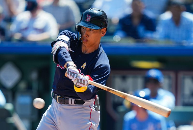 Sep 3, 2023; Kansas City, Missouri, USA; Boston Red Sox left fielder Masataka Yoshida (7) hits a single during the second inning against the Kansas City Royals at Kauffman Stadium. Mandatory Credit: Jay Biggerstaff-USA TODAY Sports