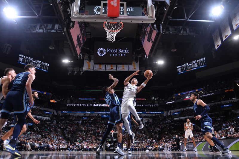 SAN ANTONIO, TX - MARCH 22  Keldon Johnson #3 of the San Antonio Spurs drives to the basket during the game against the Memphis Grizzlies on March 22, 2024 at the Frost Bank Center in San Antonio, Texas. NOTE TO USER: User expressly acknowledges and agrees that, by downloading and or using this photograph, user is consenting to the terms and conditions of the Getty Images License Agreement. Mandatory Copyright Notice: Copyright 2024 NBAE (Photos by Michael Gonzales/NBAE via Getty Images)