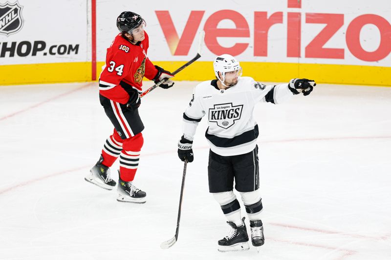 Oct 26, 2025; Chicago, Illinois, USA; Los Angeles Kings left wing Kevin Fiala (22) celebrates after scoring against the Chicago Blackhawks during the second period at United Center. Mandatory Credit: Kamil Krzaczynski-Imagn Images