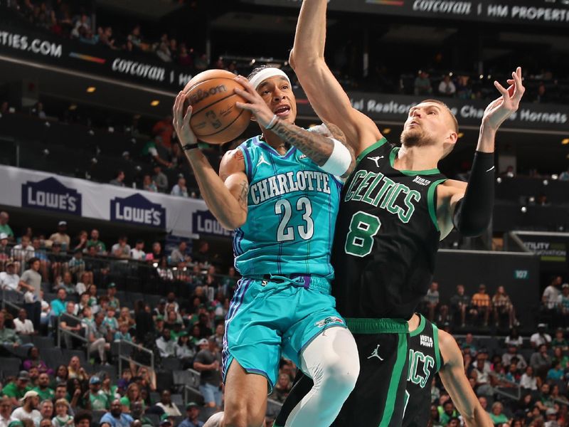 CHARLOTTE, NC - APRIL 1: Tre Mann #23 of the Charlotte Hornets drives to the basket during the game against the Boston Celtics on April 1, 2024 at Spectrum Center in Charlotte, North Carolina. NOTE TO USER: User expressly acknowledges and agrees that, by downloading and or using this photograph, User is consenting to the terms and conditions of the Getty Images License Agreement. Mandatory Copyright Notice: Copyright 2024 NBAE (Photo by Kent Smith/NBAE via Getty Images)