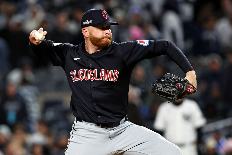 Oct 14, 2024; Bronx, New York, USA; Cleveland Guardians pitcher Erik Sabrowski (62) pitches during the eighth inning against the New York Yankees in game one of the ALCS for the 2024 MLB Playoffs at Yankee Stadium. Mandatory Credit: Wendell Cruz-Imagn Images