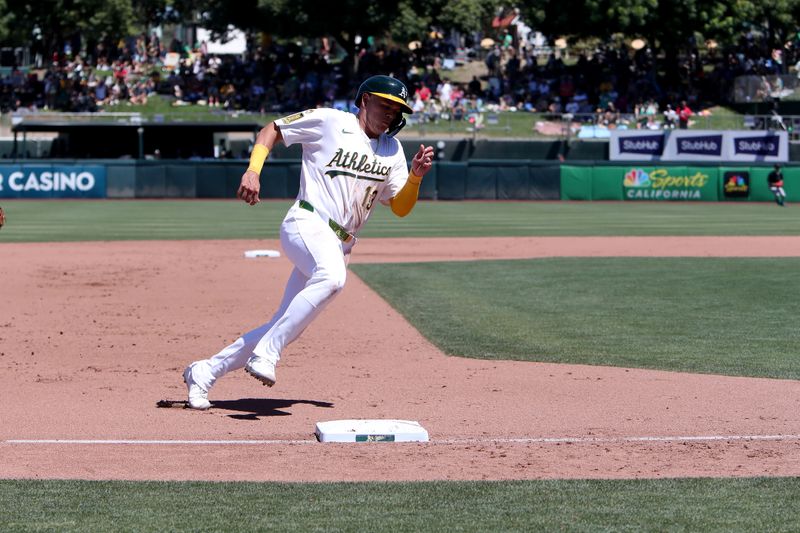Aug 3, 2025; West Sacramento, California, USA; Athletics third baseman Gio Urshela (13) rounds third base and scores a run against the Arizona Diamondbacks during the fifth inning at Sutter Health Park. Mandatory Credit: Dennis Lee-Imagn Images