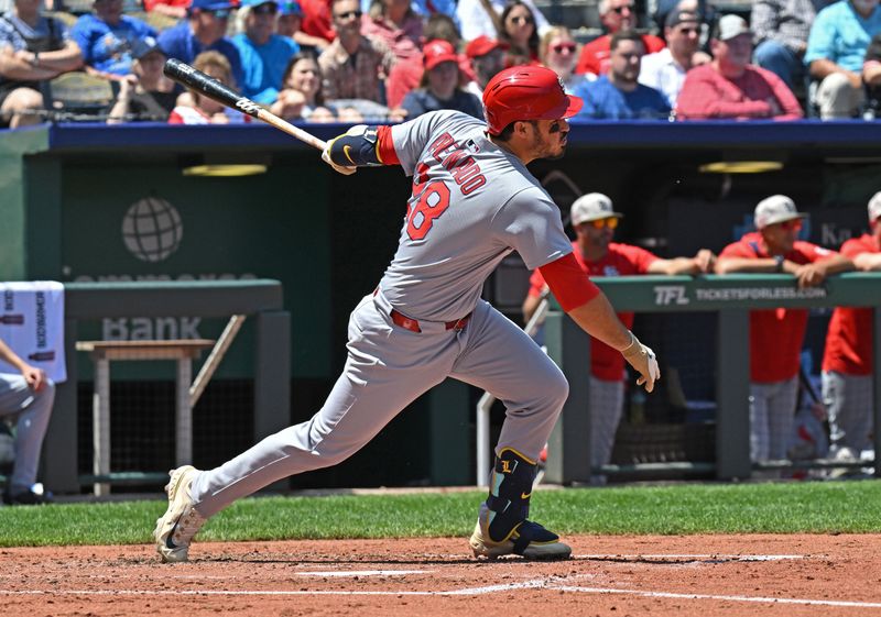 May 18, 2025; Kansas City, Missouri, USA;  St. Louis Cardinals third baseman Nolan Arenado (28) singles in the third inning against the Kansas City Royals at Kauffman Stadium. Mandatory Credit: Peter Aiken-Imagn Images