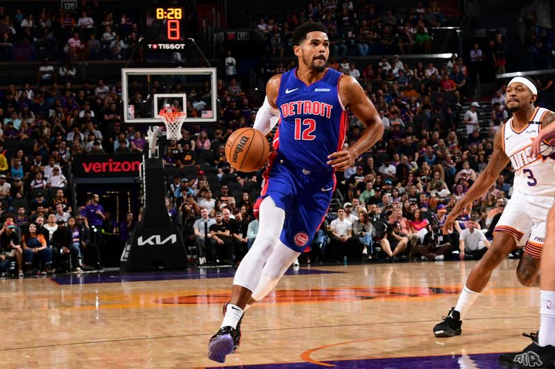 PHOENIX, AZ - OCTOBER 11: Tobias Harris #12 of the Detroit Pistons drives to the basket during the game on October 11, 2024 at Footprint Center in Phoenix, Arizona. NOTE TO USER: User expressly acknowledges and agrees that, by downloading and or using this photograph, user is consenting to the terms and conditions of the Getty Images License Agreement. Mandatory Copyright Notice: Copyright 2024 NBAE (Photo by Kate Frese/NBAE via Getty Images)