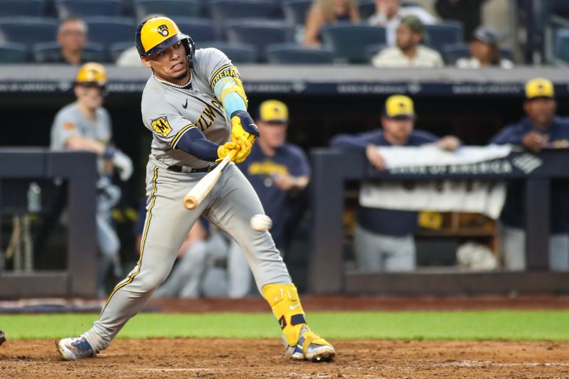 Sep 9, 2023; Bronx, New York, USA;  Milwaukee Brewers catcher William Contreras (24) hits a two-run single in the ninth inning New York Yankees at Yankee Stadium. Mandatory Credit: Wendell Cruz-USA TODAY Sports