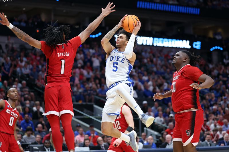 Mar 31, 2024; Dallas, TX, USA; Duke Blue Devils guard Tyrese Proctor (5) shoots against North Carolina State Wolfpack guard Jayden Taylor (1) in the first half in the finals of the South Regional of the 2024 NCAA Tournament at American Airline Center. Mandatory Credit: Kevin Jairaj-USA TODAY Sports