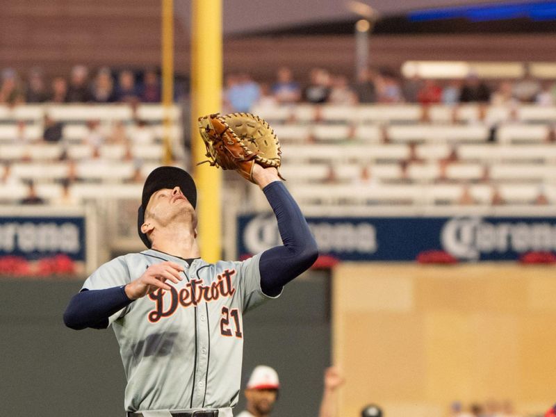 Jul 2, 2024; Minneapolis, Minnesota, USA; Minnesota Twins catcher Ryan Jeffers (27) is retired after hitting a fly ball caught by Detroit Tigers first base Mark Canha (21) in the eighth inning at Target Field. Mandatory Credit: Matt Blewett-USA TODAY Sports