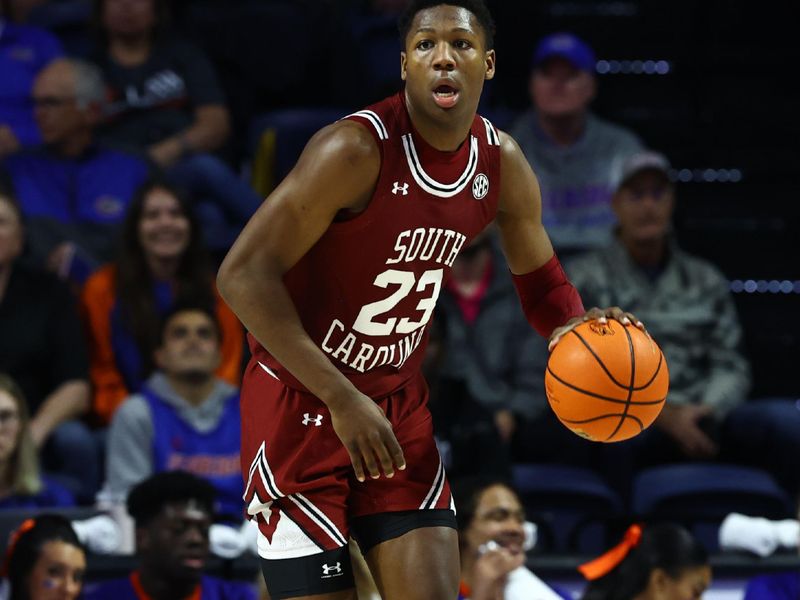 Jan 25, 2023; Gainesville, Florida, USA; South Carolina Gamecocks forward Gregory Jackson II (23) dribbles against the Florida Gators during the first half at Exactech Arena at the Stephen C. O'Connell Center. Mandatory Credit: Kim Klement-USA TODAY Sports