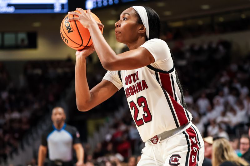 Jan 28, 2024; Columbia, South Carolina, USA; South Carolina Gamecocks guard Bree Hall (23) attempts a three point basket against the Vanderbilt Commodores in the second half at Colonial Life Arena. Mandatory Credit: Jeff Blake-USA TODAY Sports