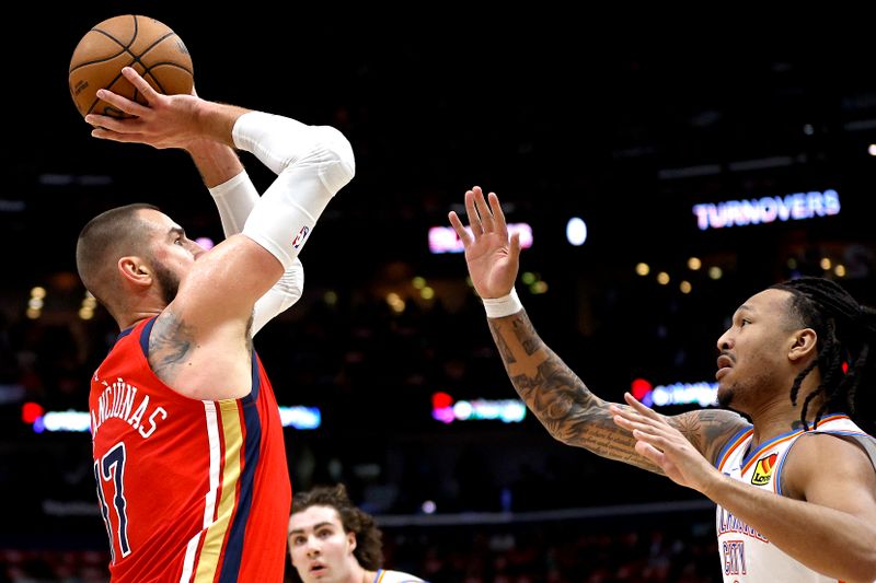 NEW ORLEANS, LOUISIANA - APRIL 27: Jonas Valanciunas #17 of the New Orleans Pelicans shoots over Jaylin Williams #6 of the Oklahoma City Thunder during the first quarter of Game Three of the first round of the 2024 NBA Playoffs at Smoothie King Center on April 27, 2024 in New Orleans, Louisiana. NOTE TO USER: User expressly acknowledges and agrees that, by downloading and or using this photograph, User is consenting to the terms and conditions of the Getty Images License Agreement. (Photo by Sean Gardner/Getty Images)