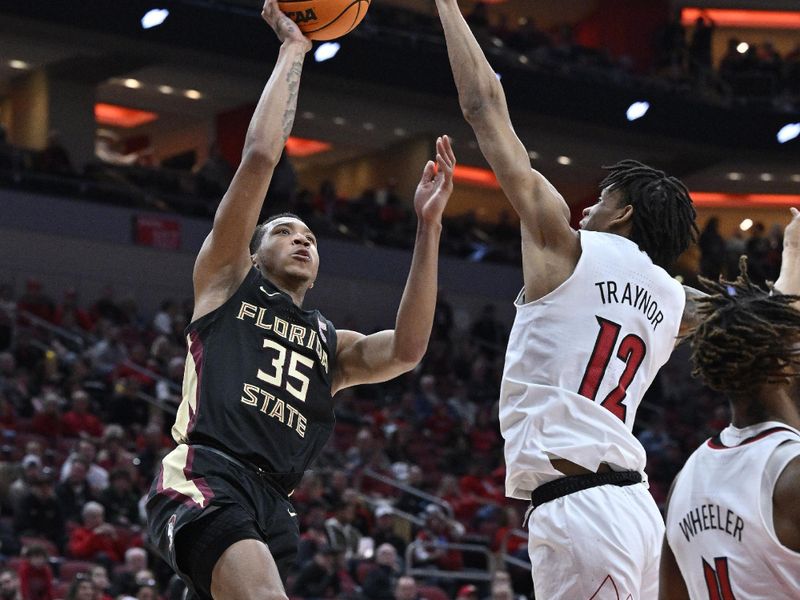 Feb 4, 2023; Louisville, Kentucky, USA;  Florida State Seminoles guard Matthew Cleveland (35) shoots against Louisville Cardinals forward JJ Traynor (12) during the first half at KFC Yum! Center. Mandatory Credit: Jamie Rhodes-USA TODAY Sports