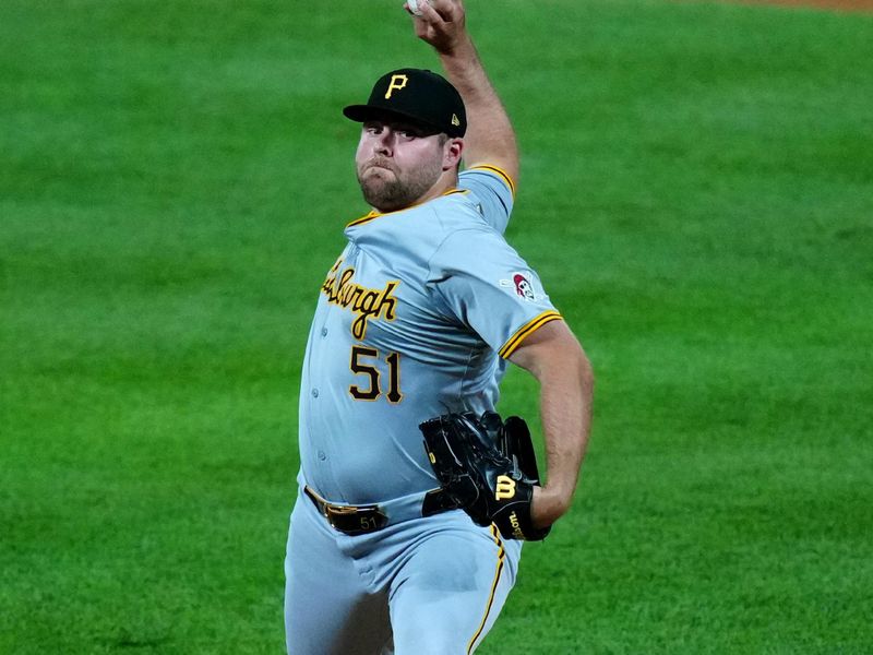 Jun 14, 2024; Denver, Colorado, USA; Pittsburgh Pirates relief pitcher David Bednar (51) delivers a pitch in the ninth inning against the Colorado Rockies at Coors Field. Mandatory Credit: Ron Chenoy-USA TODAY Sports