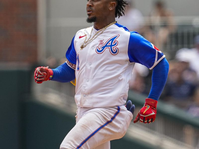 Jul 30, 2023; Cumberland, Georgia, USA; Atlanta Braves second baseman Ozzie Albies (1) runs after hitting a double against the Milwaukee Brewers during the eighth inning at Truist Park. Mandatory Credit: Dale Zanine-USA TODAY Sports